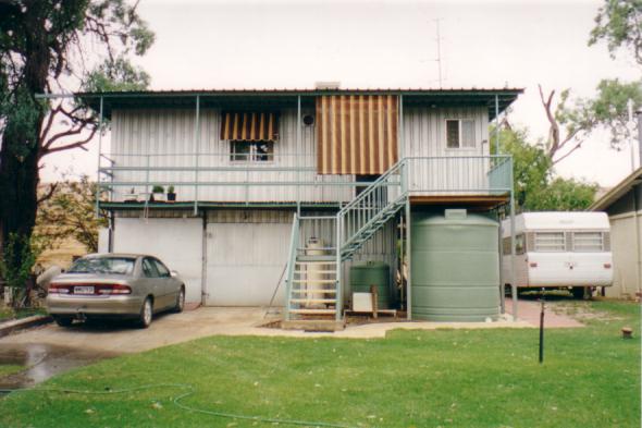 Technically, the back of the shack, with actual grass.  You'll see what I mean by 'actual grass' once you view the pics of the s