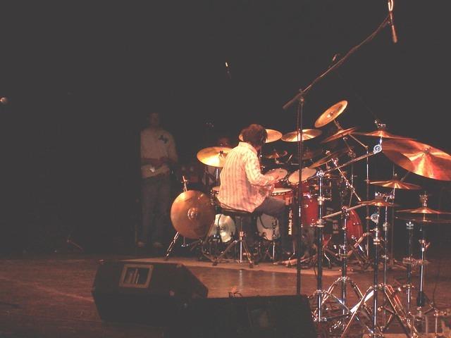 Neil Garthy's 10 pedal kit... (notice the ride cymbal and hi-hat on his left by his feet.  Yeah, those are on pedals too.)